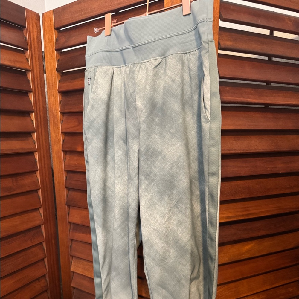 Athleta Brooklyn pants, 10 Tall (31” inseam), light green print.